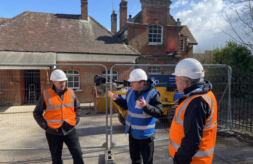 Pictured; Mark Miller (blue jacket) briefs Steve Brine MP at the works site joined by representatives from SWR and the contractors.