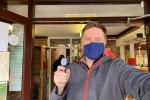 Pictured; Steve with the temperature gun at the entrance to Park Surgery