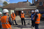 Pictured; Mark Miller (blue jacket) briefs Steve Brine MP at the works site joined by representatives from SWR and the contractors.